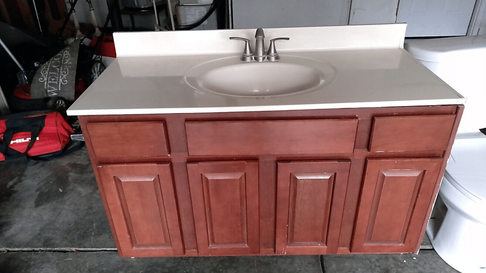 https://morenobath.com/product_images/uploaded_images/vanity-stains-on-a-used-bathroom-vanity-for-sale..png